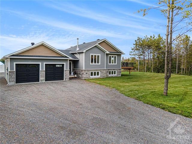 710 Mcfarlane Road, House detached with 3 bedrooms, 2 bathrooms and 8 parking in North Grenville ON | Image 2