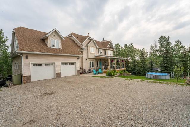 282042 128 Street W, House detached with 4 bedrooms, 3 bathrooms and 6 parking in Foothills County AB | Image 1