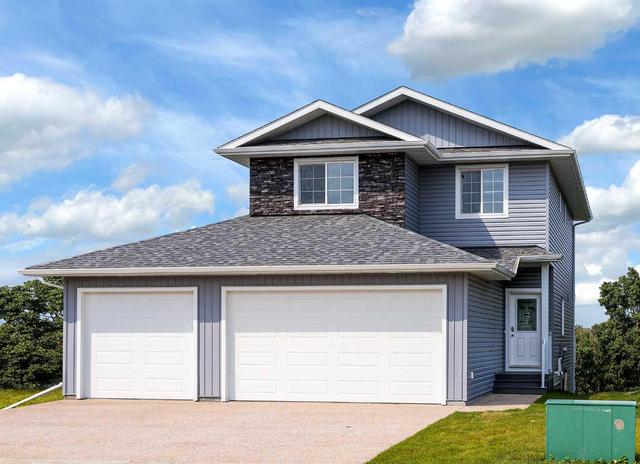 5208 36 Avenue, House detached with 3 bedrooms, 2 bathrooms and 3 parking in Camrose AB | Image 1