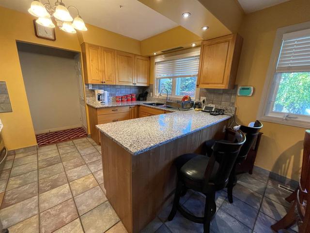 9612 91a Avenue, House detached with 5 bedrooms, 2 bathrooms and 5 parking in Grande Prairie AB | Image 7