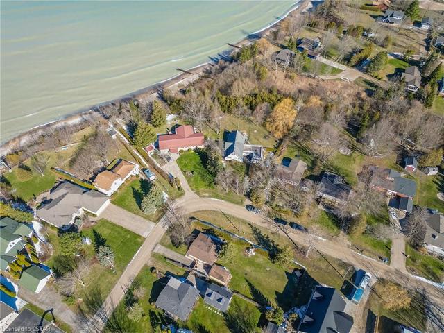 You can see the Beach Access between the 4th and 5th home to the left.  Additional Beach Access on the other side of the Ravine as well. | Image 37