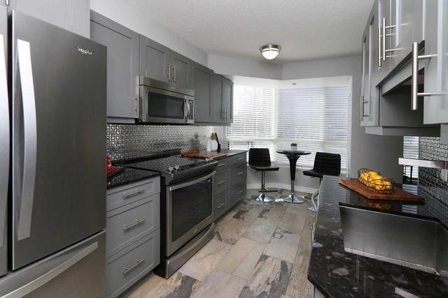 205 - 100 Millside Dr, Condo with 2 bedrooms, 2 bathrooms and 1 parking in Milton ON | Image 6