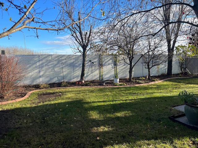 Privacy Slotted Chain-Link Fence with Gate to Walking Trails | Image 37