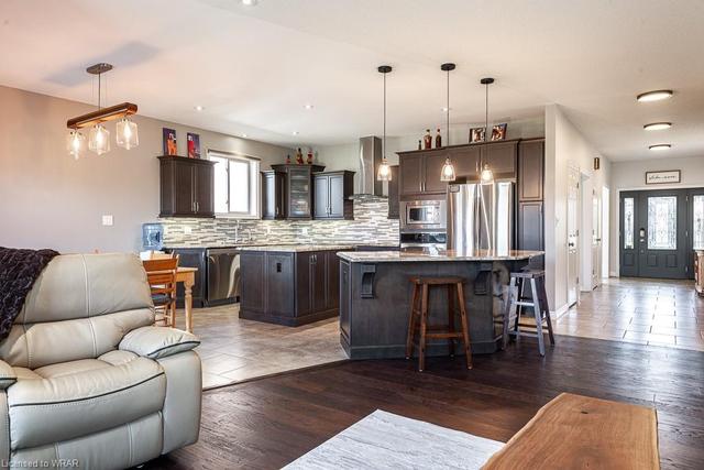 Open Concept Kitchen, Dinette and Family Room Area | Image 8