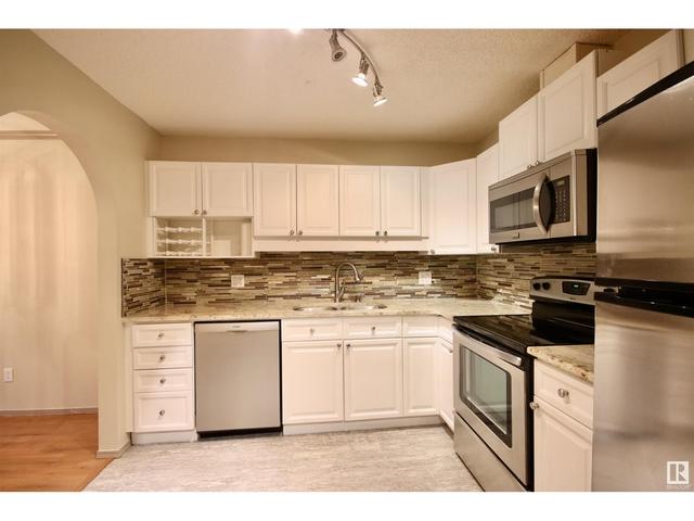 211 - 17151 94a Av Nw, Condo with 2 bedrooms, 2 bathrooms and 1 parking in Edmonton AB | Image 3