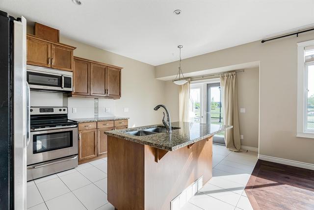 2 - 441 Millennium Drive, Home with 3 bedrooms, 3 bathrooms and 4 parking in Wood Buffalo AB | Image 5
