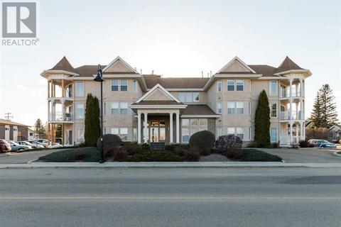 9, - 5034 53 Street, Condo with 2 bedrooms, 1 bathrooms and 1 parking in Lacombe AB | Card Image
