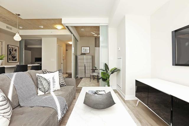 411 - 210 Simcoe St, Condo with 3 bedrooms, 2 bathrooms and 1 parking in Toronto ON | Image 24