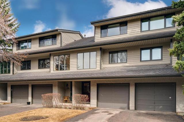 122 Point Drive Nw, House attached with 2 bedrooms, 1 bathrooms and 2 parking in Calgary AB | Card Image