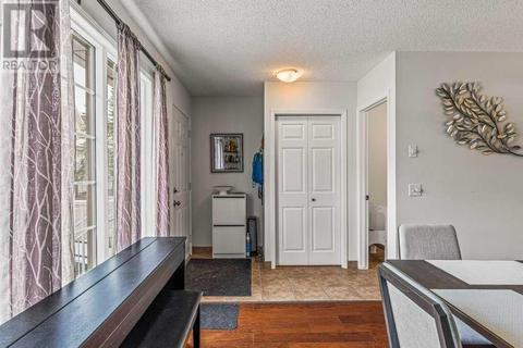 33, - 1050 Cougar Creek Drive, House attached with 3 bedrooms, 2 bathrooms and 217 parking in Canmore AB | Card Image