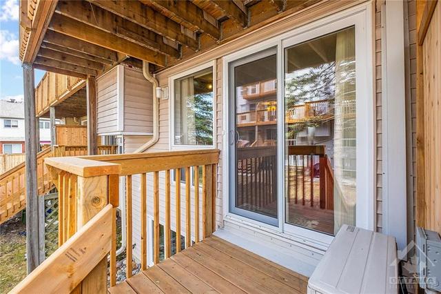 Exterior back deck with patio doors to Living Rm. | Image 18