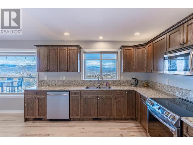 1623 Sunrise Road, House detached with 5 bedrooms, 3 bathrooms and 5 parking in Kelowna BC | Image 7