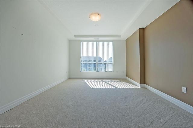 405 - 240 Villagewalk Boulevard, House attached with 2 bedrooms, 2 bathrooms and 1 parking in London ON | Image 17