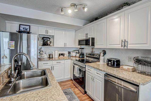 22 Cimarron Grove Rise, House detached with 3 bedrooms, 2 bathrooms and 2 parking in Okotoks AB | Image 10