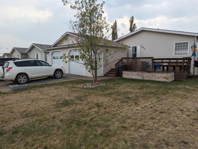 593 Stewart Street, House detached with 3 bedrooms, 2 bathrooms and 6 parking in Grande Prairie County No. 1 AB | Image 1