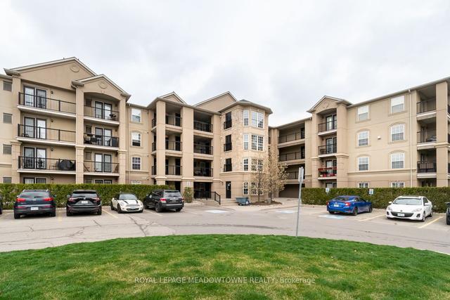 406 - 1483 Maple Ave, Condo with 1 bedrooms, 1 bathrooms and 1 parking in Milton ON | Image 1