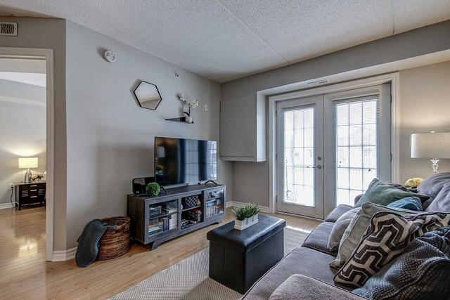 103 - 1360 Main St E, Townhouse with 1 bedrooms, 1 bathrooms and 2 parking in Milton ON | Image 2
