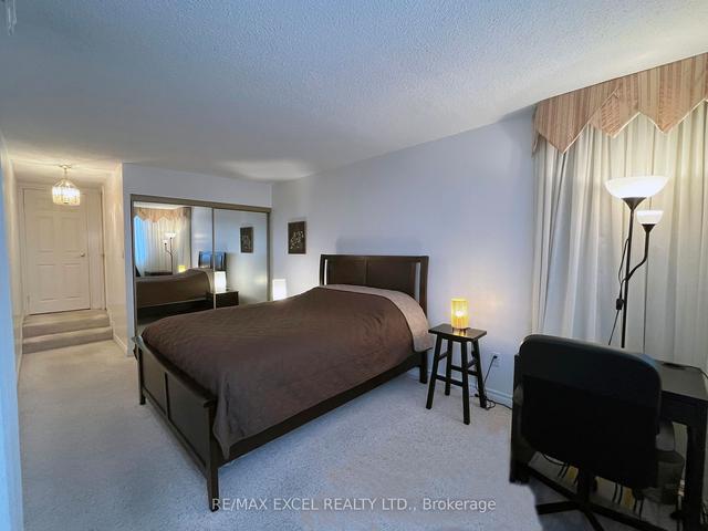 1210 - 2350 Bridletowne Circ, Condo with 2 bedrooms, 2 bathrooms and 1 parking in Toronto ON | Image 3