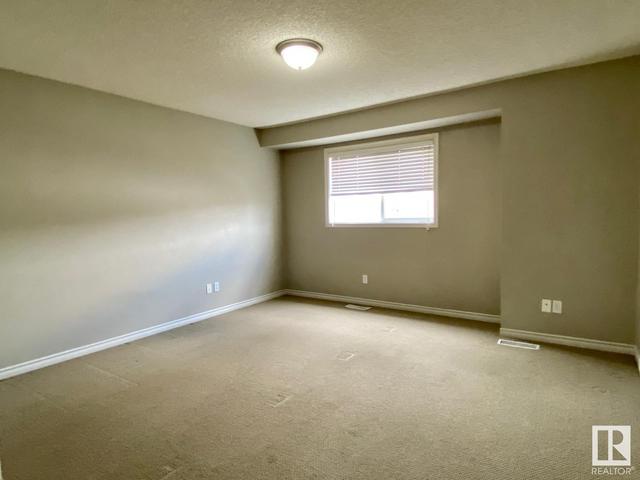 112 - 13825 155 Av Nw Nw, House attached with 2 bedrooms, 2 bathrooms and 2 parking in Edmonton AB | Image 11