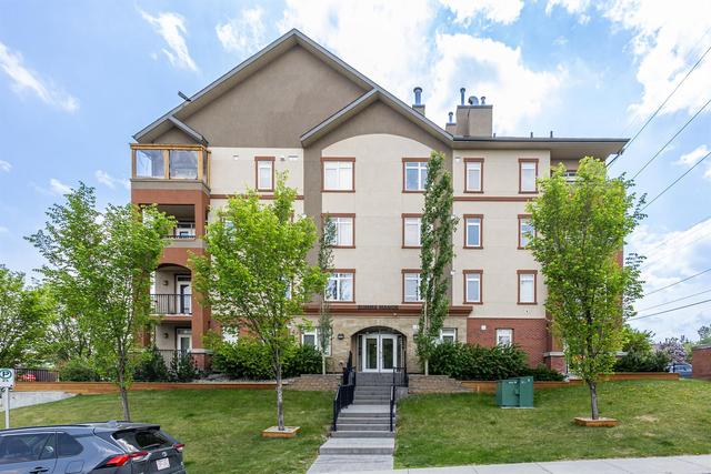 401 - 2419 Centre Street Nw, Condo with 2 bedrooms, 2 bathrooms and 1 parking in Calgary AB | Image 1