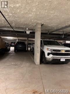 Two secure underground parking spots, white truck & #80 | Image 32