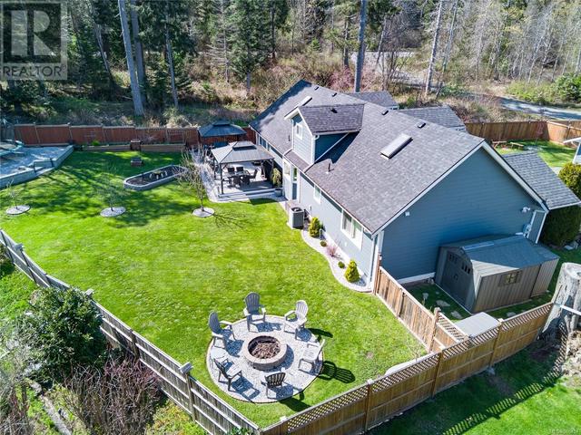 269 Spindrift Rd, House detached with 4 bedrooms, 3 bathrooms and 6 parking in Comox Valley A BC | Image 56