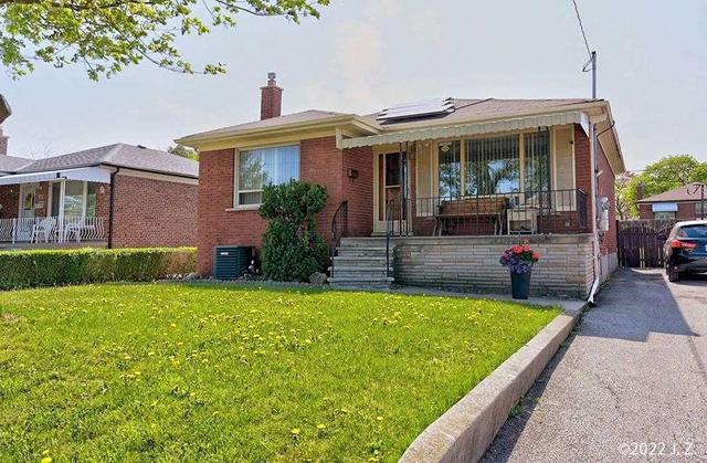 8 Jeffcoat Dr, House detached with 2 bedrooms, 2 bathrooms and 3 parking in Toronto ON | Card Image