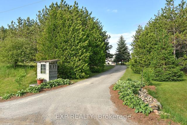 598011 2nd Line W, House detached with 4 bedrooms, 5 bathrooms and 12 parking in Mulmur ON | Image 38