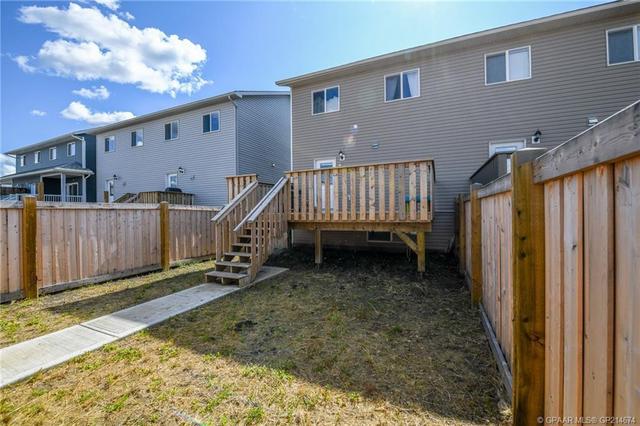 8410 101 Avenue, Home with 3 bedrooms, 2 bathrooms and 2 parking in Greenview No. 16 AB | Image 26