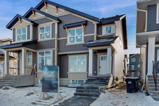 161 Ambleton Drive Nw, Home with 3 bedrooms, 2 bathrooms and 2 parking in Calgary AB | Image 7
