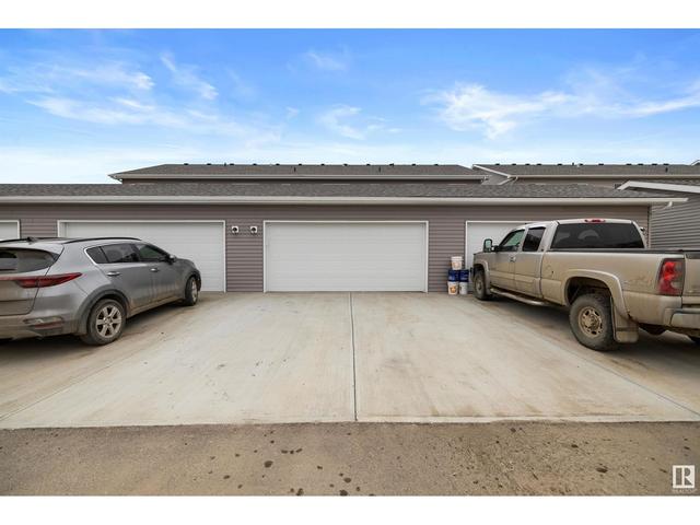 8515 96 Av, House attached with 3 bedrooms, 2 bathrooms and null parking in Morinville AB | Image 37