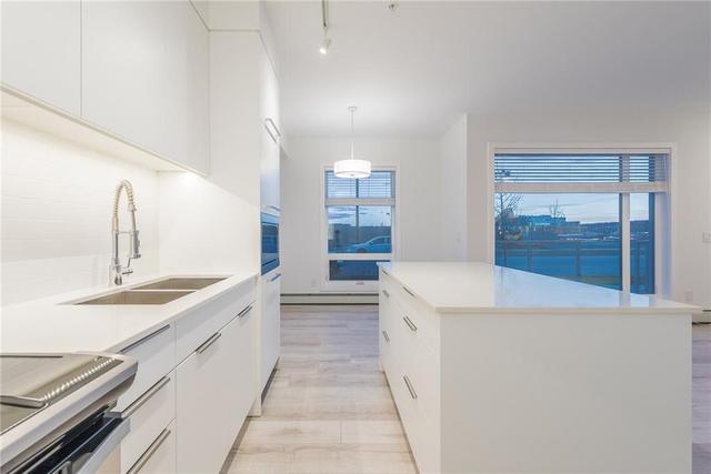 108 - 3125 39 Street Nw, Home with 2 bedrooms, 2 bathrooms and 1 parking in Calgary AB | Image 31