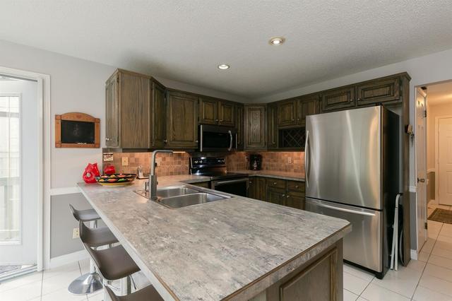 608 Woodbine Boulevard Sw, House detached with 4 bedrooms, 2 bathrooms and 4 parking in Calgary AB | Image 7