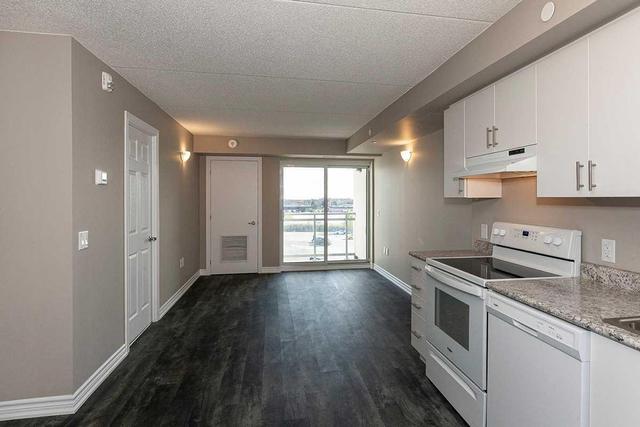 405 - 716 Main St E, Condo with 2 bedrooms, 2 bathrooms and 1 parking in Milton ON | Image 2