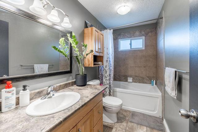 56 White Cap Close, House detached with 4 bedrooms, 2 bathrooms and 2 parking in Sylvan Lake AB | Image 12