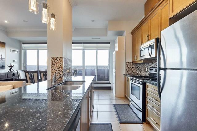 ph 104 - 133 Wynford Dr, Condo with 2 bedrooms, 2 bathrooms and 1 parking in Toronto ON | Image 4