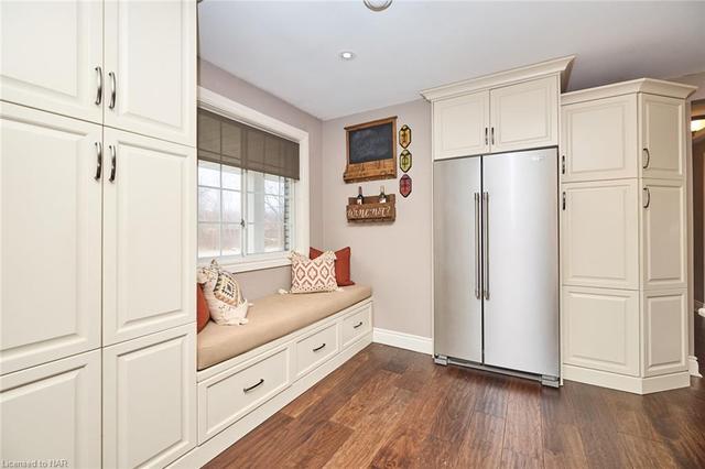 loads of storage - ample pantry cabinets - lovely window seat area | Image 7