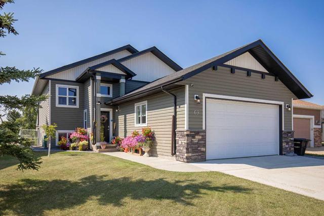 69 Iron Wolf Boulevard, House detached with 4 bedrooms, 3 bathrooms and 4 parking in Lacombe AB | Image 1