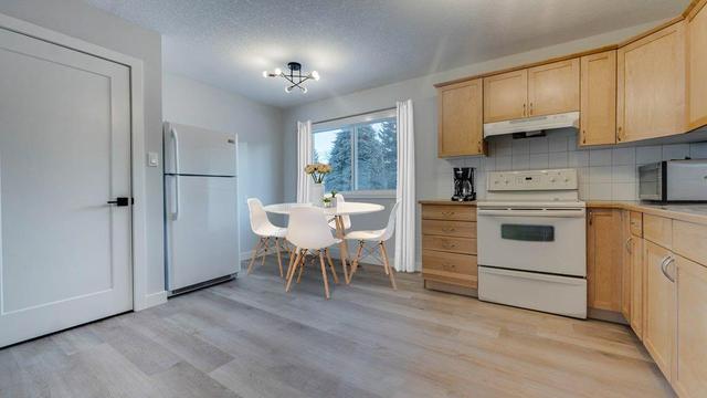 215 Tache Avenue Nw, House detached with 5 bedrooms, 2 bathrooms and 4 parking in Calgary AB | Image 15