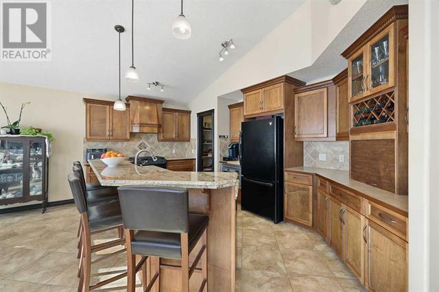 627 Boulder Creek Drive Se, House detached with 3 bedrooms, 2 bathrooms and 4 parking in Rocky View County AB | Image 10