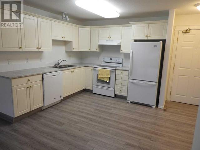 9, - 5034 53 Street, Condo with 2 bedrooms, 1 bathrooms and 1 parking in Lacombe AB | Image 6