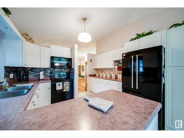11 - 9731 174 St Nw, House semidetached with 3 bedrooms, 2 bathrooms and 4 parking in Edmonton AB | Image 18