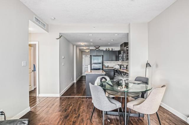 2203 - 77 Spruce Place Sw, Condo with 2 bedrooms, 2 bathrooms and 1 parking in Calgary AB | Image 2