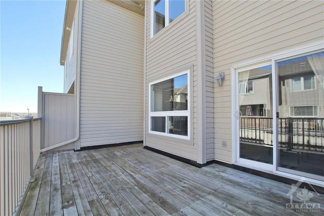 Deck just off Kitchen; great spot for summer entertaining. | Image 27