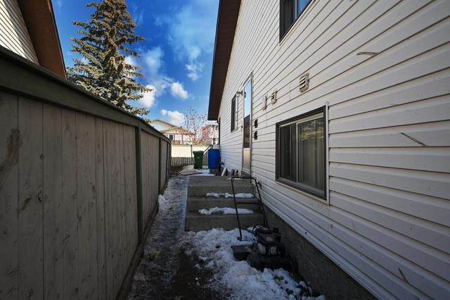 167 Templevale Road Ne, Home with 4 bedrooms, 3 bathrooms and 3 parking in Calgary AB | Image 4