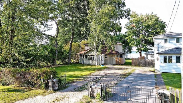 24 Lakeshore Rd, House detached with 4 bedrooms, 1 bathrooms and 5 parking in Georgina ON | Image 2