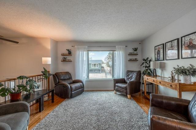 56 White Cap Close, House detached with 4 bedrooms, 2 bathrooms and 2 parking in Sylvan Lake AB | Image 5