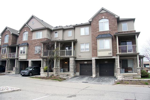 100 - 1401 Plains Rd, Townhouse with 2 bedrooms, 2 bathrooms and 2 parking in Burlington ON | Image 1