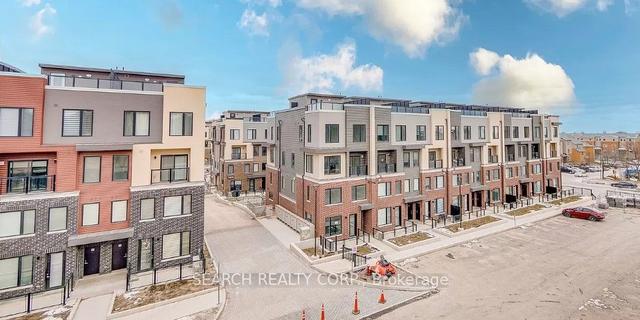 308 - 3401 Ridgeway Dr, Townhouse with 2 bedrooms, 2 bathrooms and 1 parking in Mississauga ON | Image 1