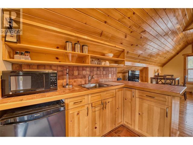 7390 Fintry Delta Road, House detached with 3 bedrooms, 3 bathrooms and 8 parking in Central Okanagan West BC | Image 36